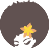 A yellow flower sitting in front of a green background.
